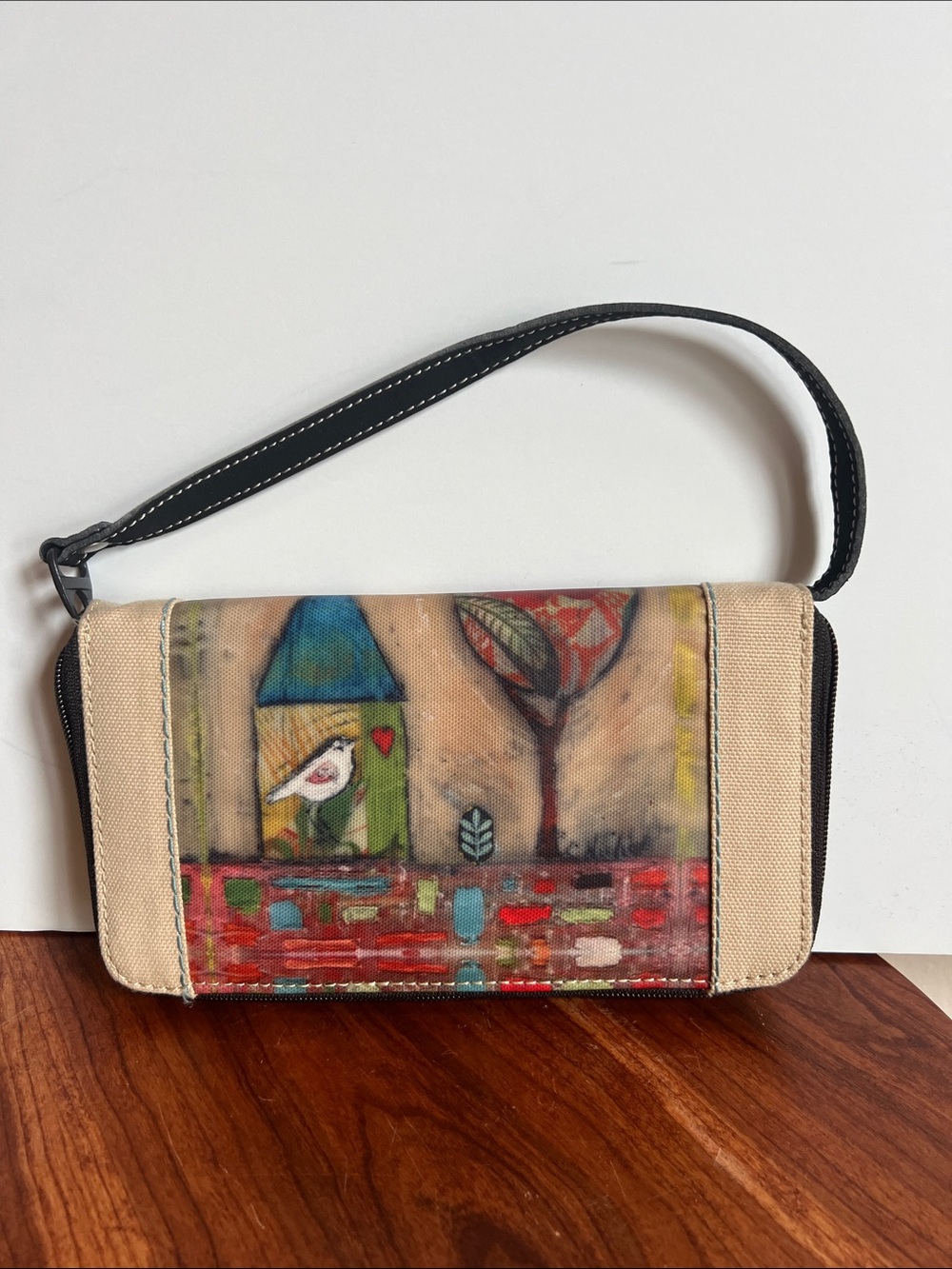 Sherpani zip around coated Canvas Wristlet with Colorful Painted Panel